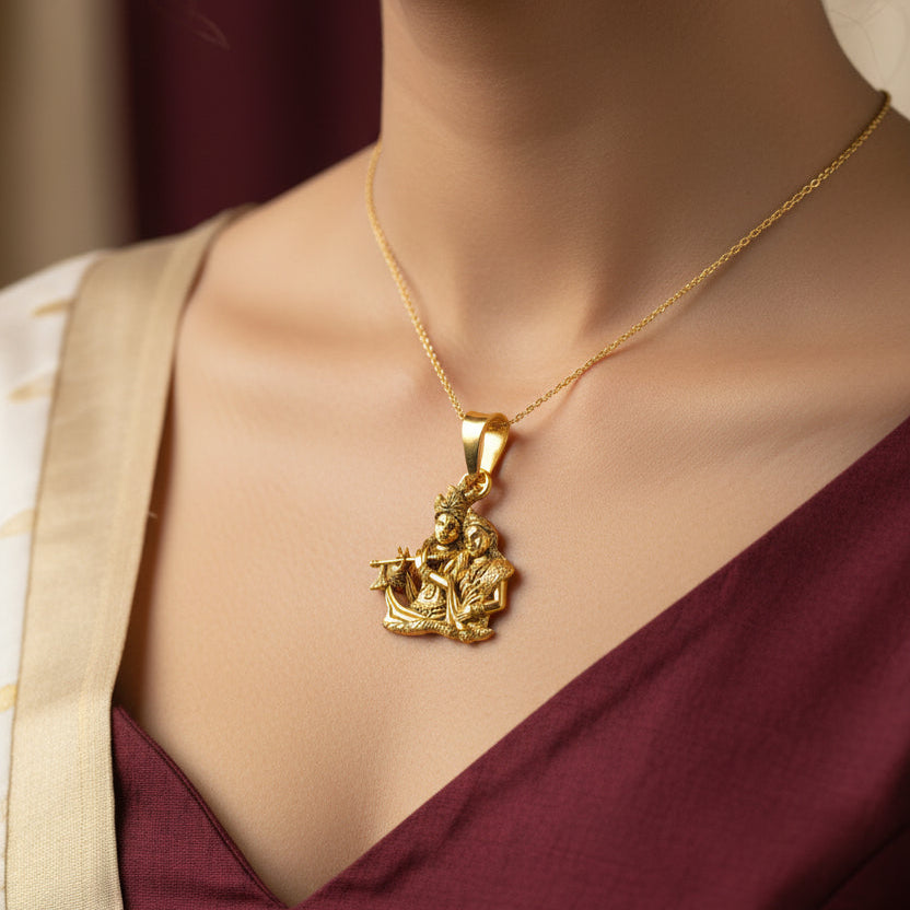 Green pendant with intricate design on a black background