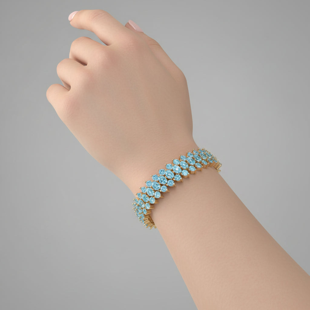 Gold ring with blue gemstones on a black background