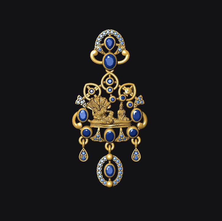 Gold pendant with blue gemstones on a black background
