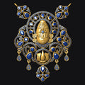 Ornate gold and blue gemstone pendant on a black background