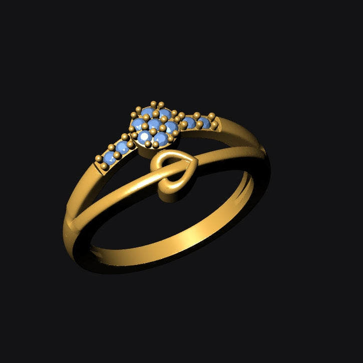 Gold ring with blue gemstones on a black background