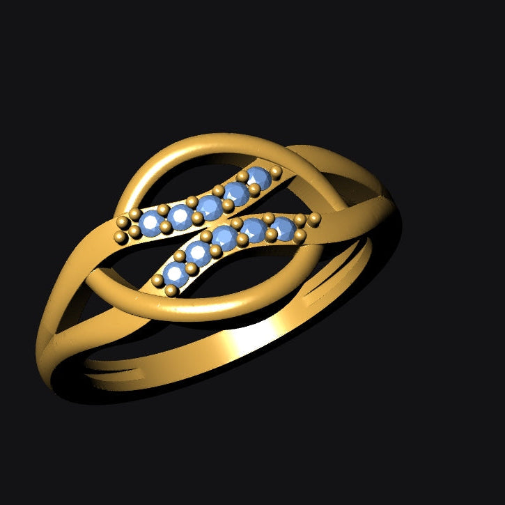 Gold ring with blue gemstones on a black background