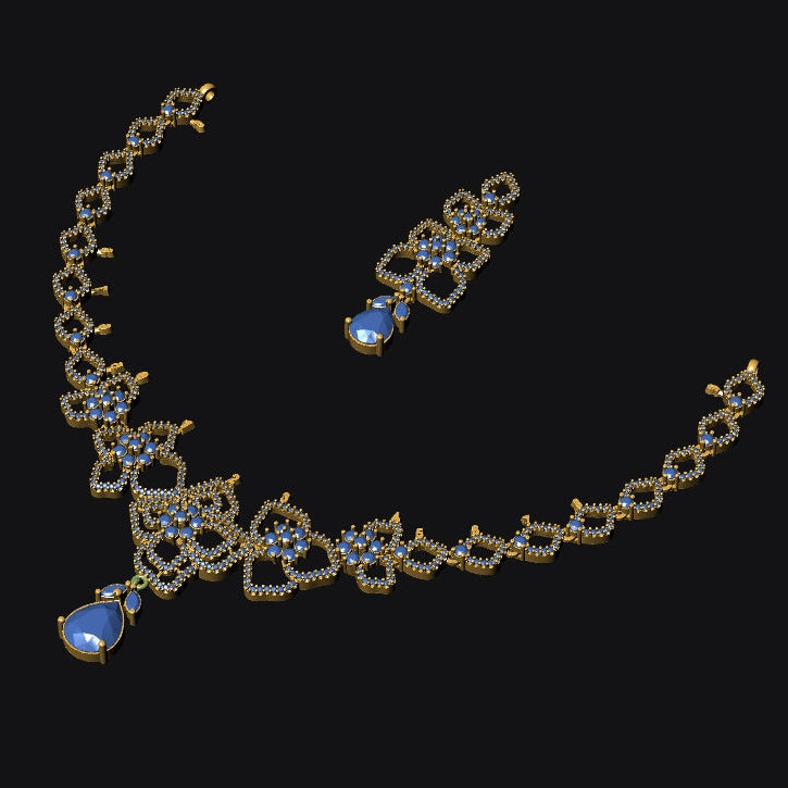 Gold necklace with blue stones on a black background