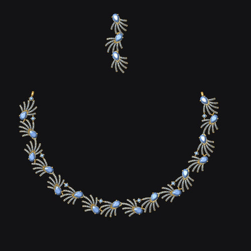 Necklace and earrings set on a black background