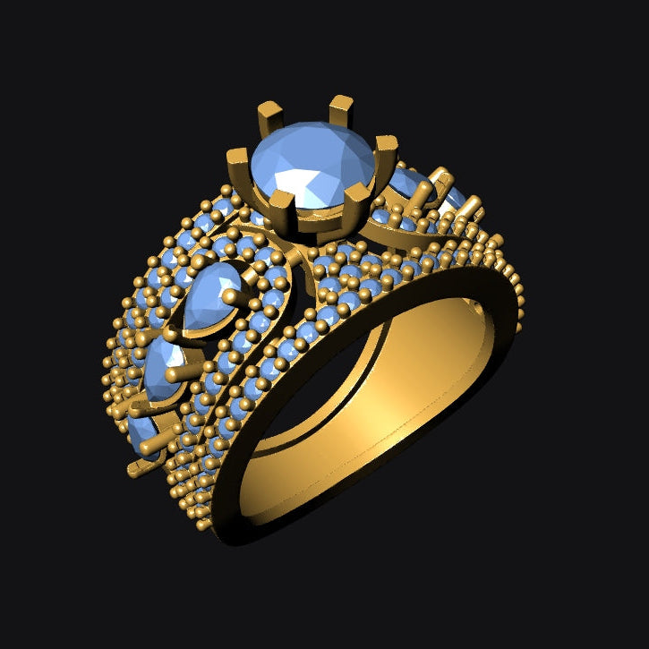 Gold ring with blue gemstones on a black background