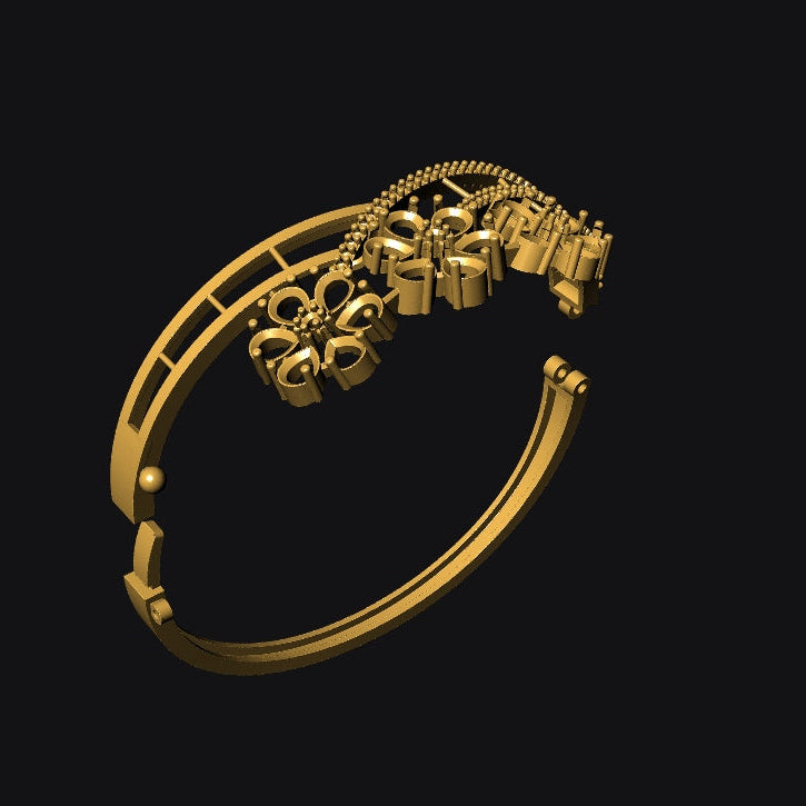 Gold bracelet with intricate designs on a black background