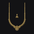 Gold necklace and earrings on a black background
