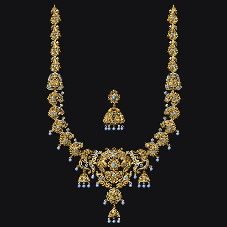 Gold necklace with matching earrings on a black background