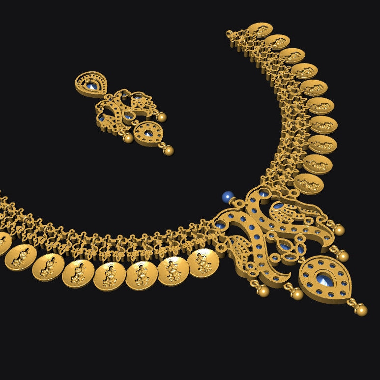 An ornate gold-toned jewelry set on a solid black background, featuring a curved necklace with circular disc elements, a matching dangling earring, and a decorative central pendant with small blue stone accents.