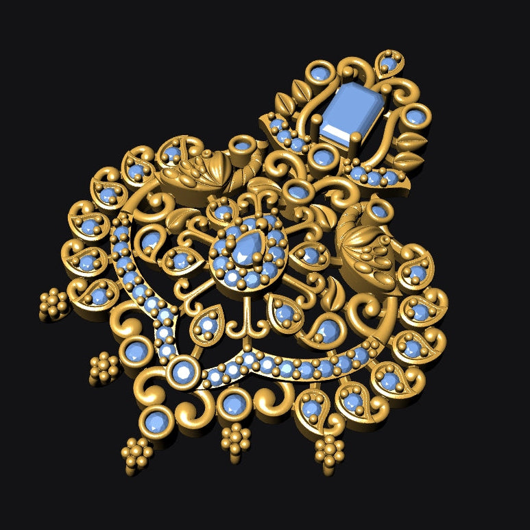 An ornate gold-toned brooch featuring intricate scrollwork, floral motifs, and multiple light blue gemstones, displayed against a solid black background.