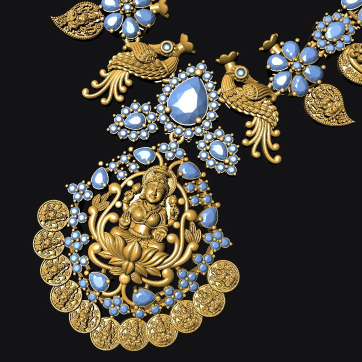 An ornate gold-toned necklace featuring a large pendant with a seated deity motif, surrounded by blue stones and gold coins, with bird and leaf motifs along the chain, set against a solid black background.