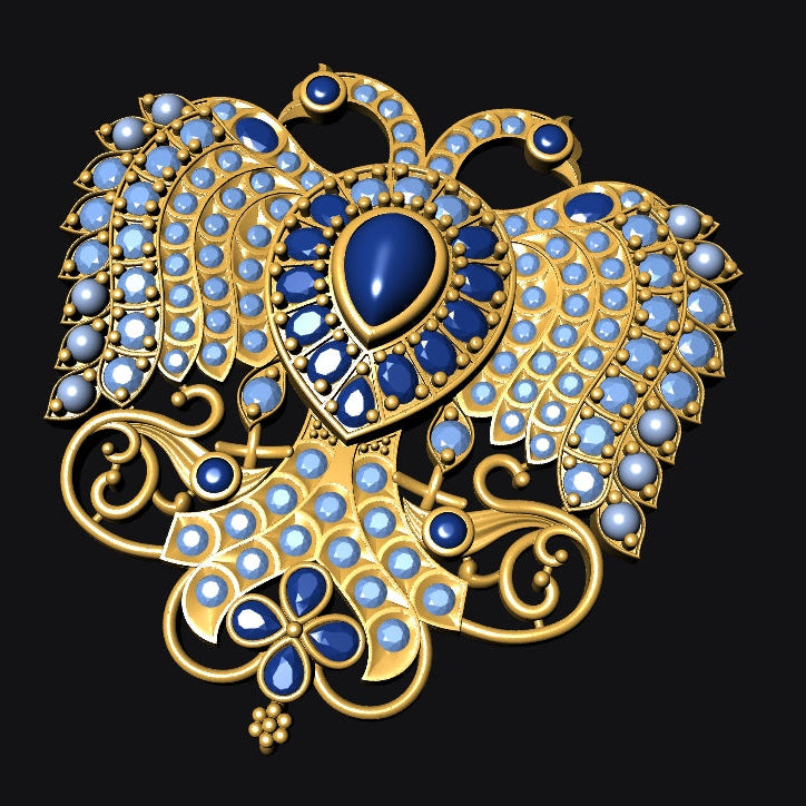 A gold-toned brooch or pendant featuring a stylized bird motif, embellished with light blue and dark blue stones, set against a solid black background.