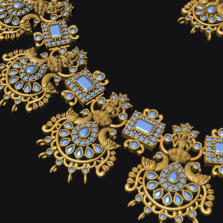 An ornate gold-toned necklace with intricate filigree detailing and light blue gemstone accents, shown against a solid black background.