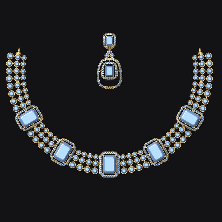 Gold-plated statement necklace and matching drop earring set with light blue rectangular gemstones and small clear stones, displayed on a solid black background.
