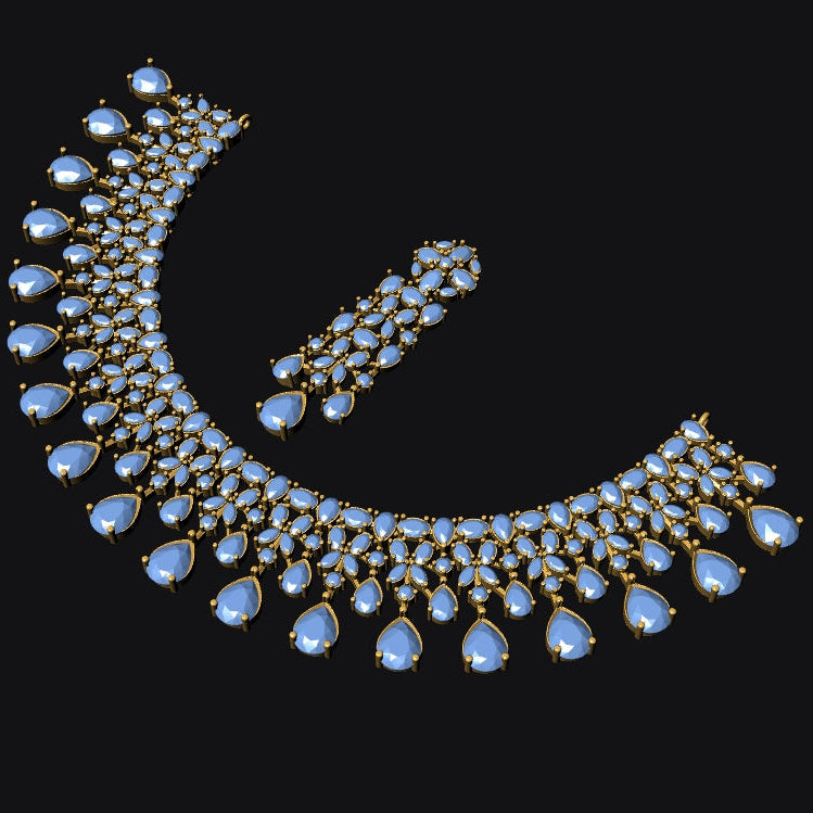 A gold-toned crescent-shaped statement necklace with matching drop earrings, featuring light blue teardrop-shaped gemstones and clear stones, set against a solid black background.