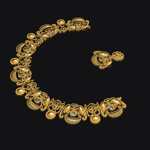 An ornate gold-toned jewelry set consisting of a curved chain bracelet and a matching clasp, displayed on a solid black background.