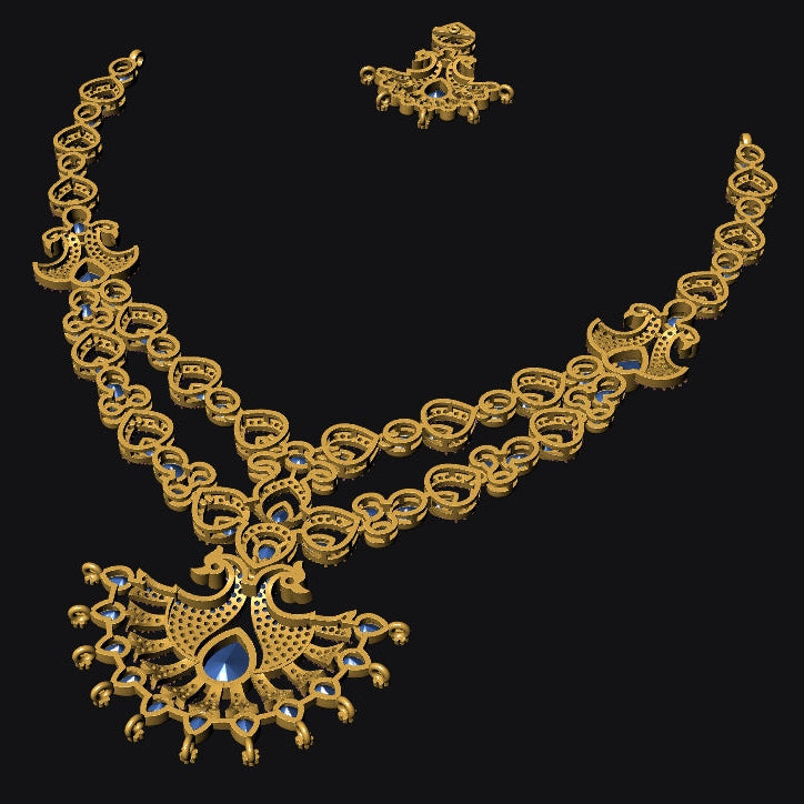 An ornate gold-toned necklace with matching stud earrings, featuring a central blue gemstone and intricate filigree detailing, set against a solid black background.
