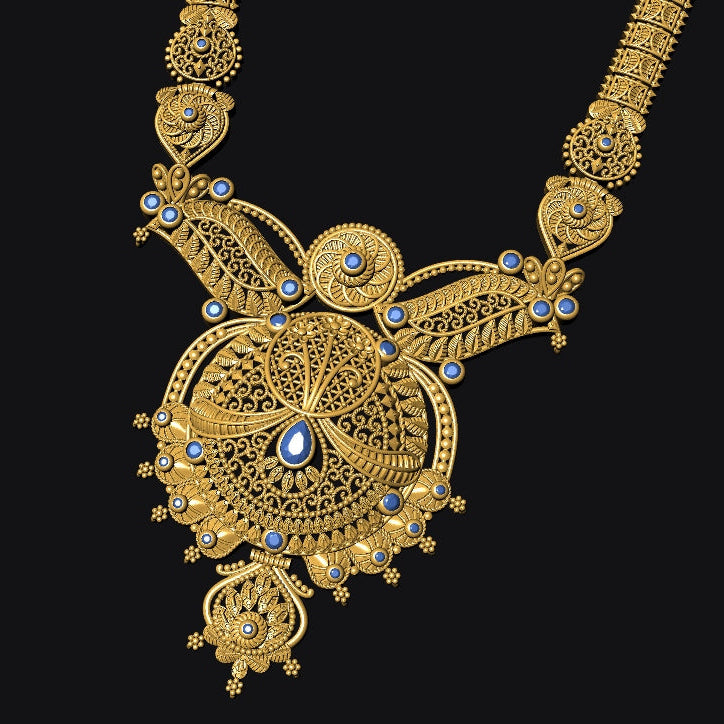 An ornate gold filigree necklace with intricate woven detailing and small blue gemstone accents, displayed against a solid black background.