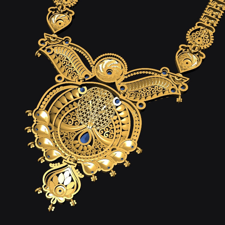 An ornate gold-toned pendant necklace with intricate filigree detailing, small blue gemstone accents, and pearl-like bead details, shown against a solid black background.