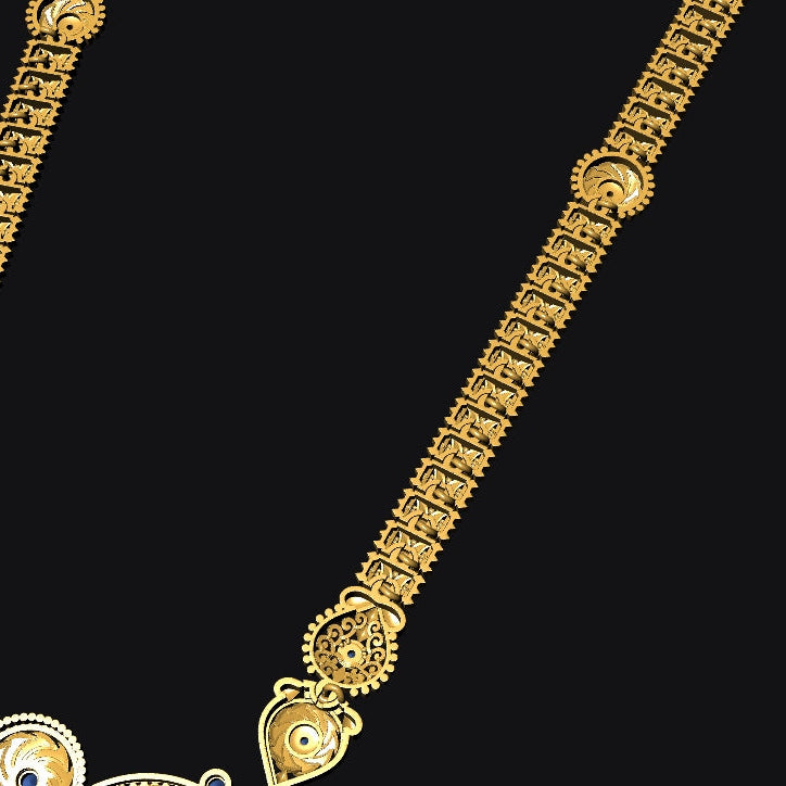 An ornate gold-toned traditional necklace with intricate filigree patterns and a decorative pendant, shown against a solid black background.