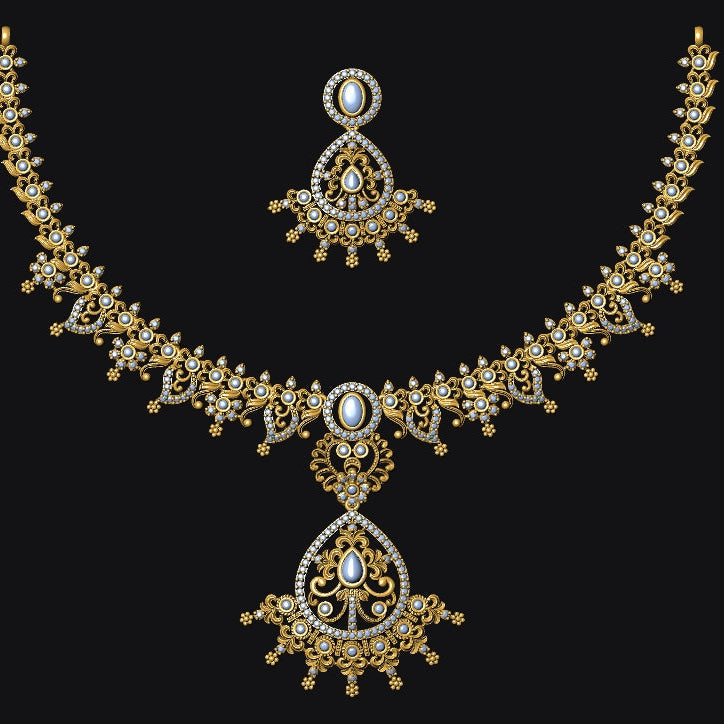 An ornate gold-toned traditional necklace set with a matching pendant and earrings, featuring intricate filigree detailing and white stone accents, displayed against a solid black background.