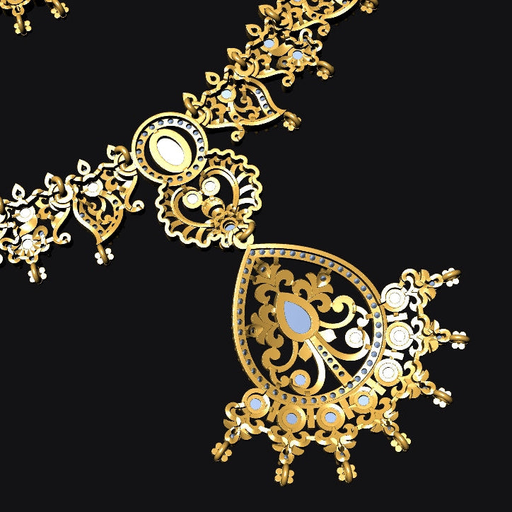 An ornate gold-toned jewelry piece with intricate filigree detailing, white stone accents, and a central teardrop-shaped pendant featuring a light blue center, shown against a solid black background.