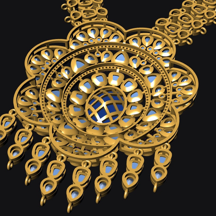 An ornate gold-toned pendant necklace with intricate filigree detailing and small light blue inlaid accents, shown against a solid black background.