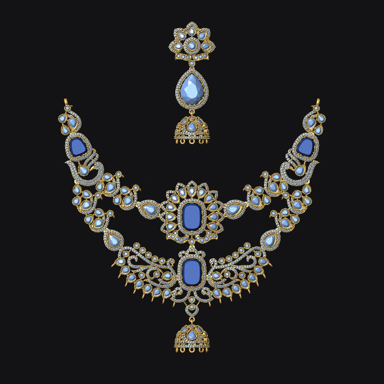 An ornate gold-toned traditional necklace set with blue stones and white stones, shown against a solid black background.