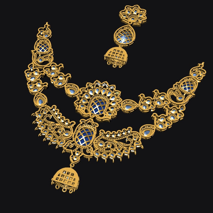 An ornate gold-toned traditional necklace set with matching earrings, featuring blue and white stone accents, displayed on a solid black background.