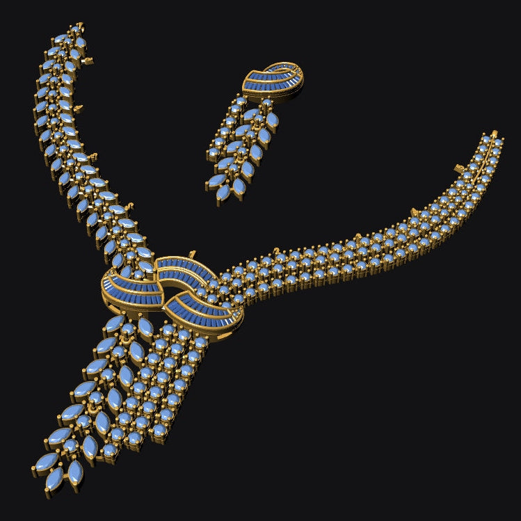 Gold-toned jewelry set featuring a curved necklace and matching drop earrings, both adorned with rows of light blue teardrop-shaped stones and accented with small clear stones, shown on a solid black background.