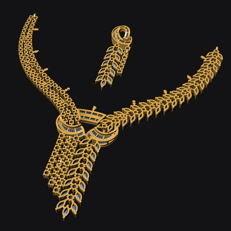 A gold-toned ornate necklace with matching drop earrings, displayed on a solid black background.
