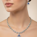 Jewelry set with necklace and earrings on a black background